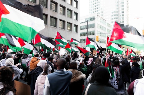Local merchants and students celebrating a successful marketing campaign in Tulkarem.