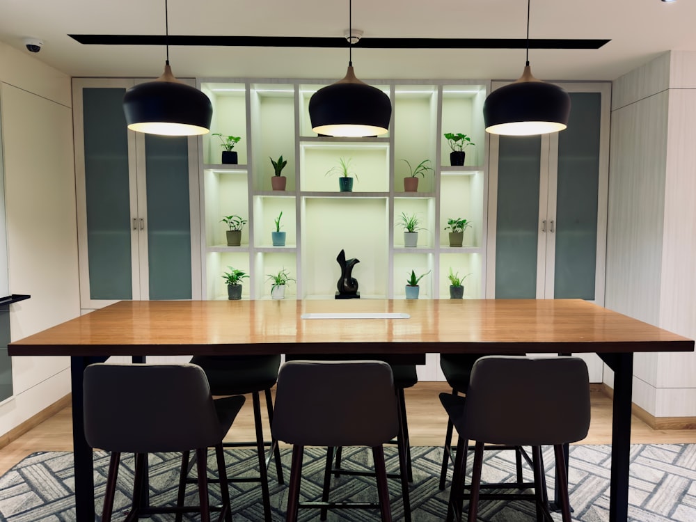 a dining room with a table and chairs