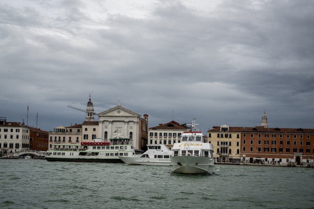 a couple of boats that are sitting in the water