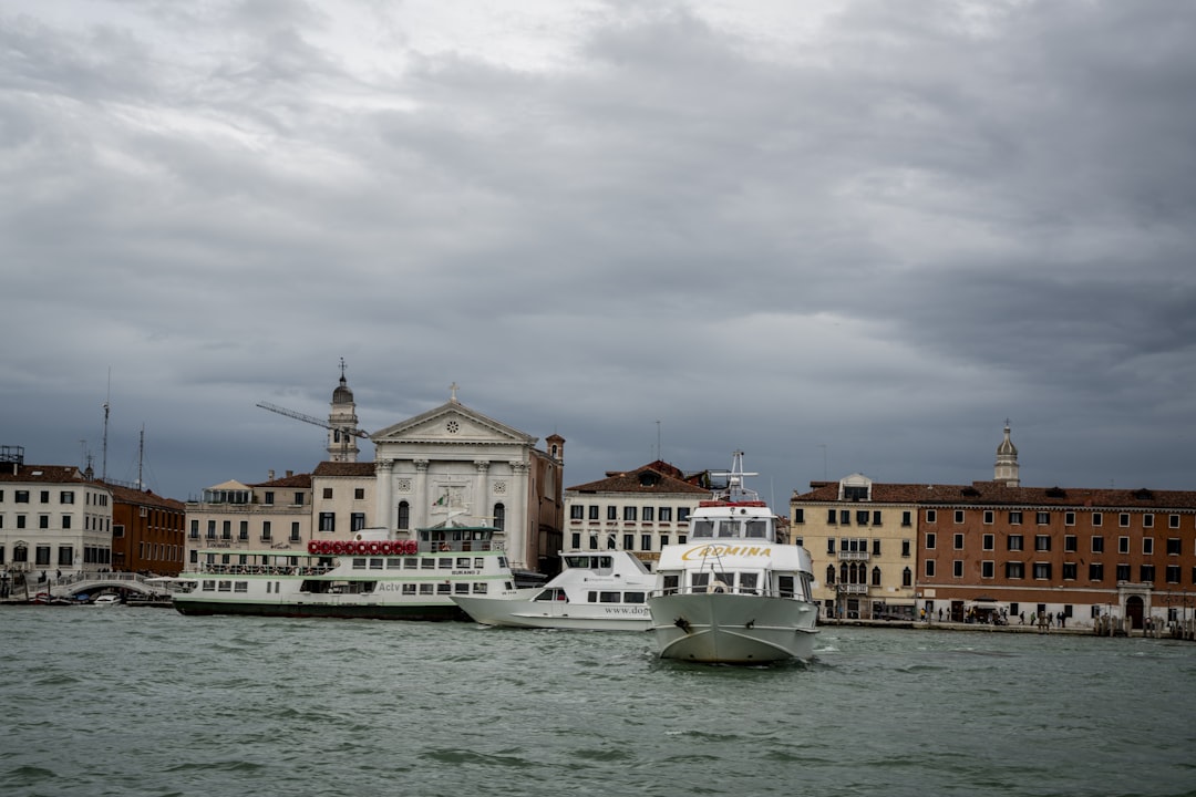 a couple of boats that are sitting in the water, Venice city