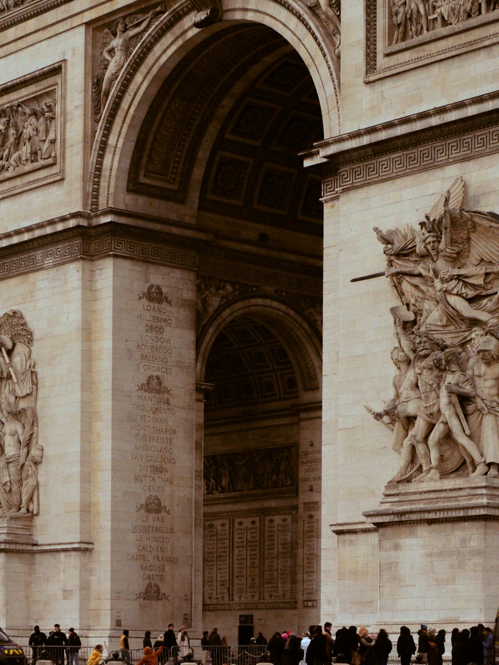 a group of people standing in front of a building