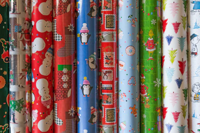A roll of colorful digital gift wrap with fun patterns suitable for kids' presents.