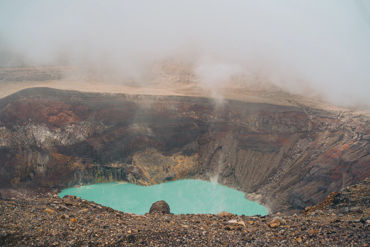 The turquoise crater lake of the Santa Ana volcano