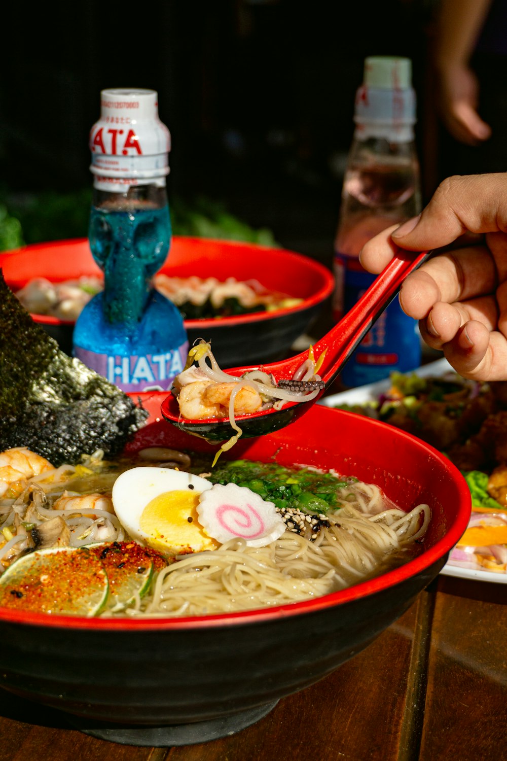 a bowl of ramen with chopsticks in it