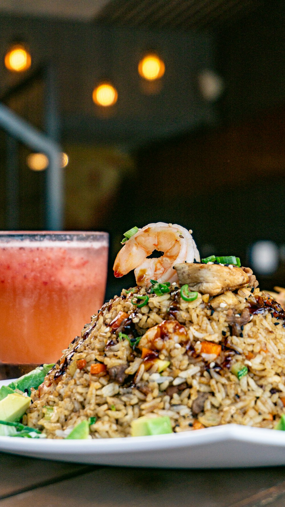 a plate of food and a drink on a table