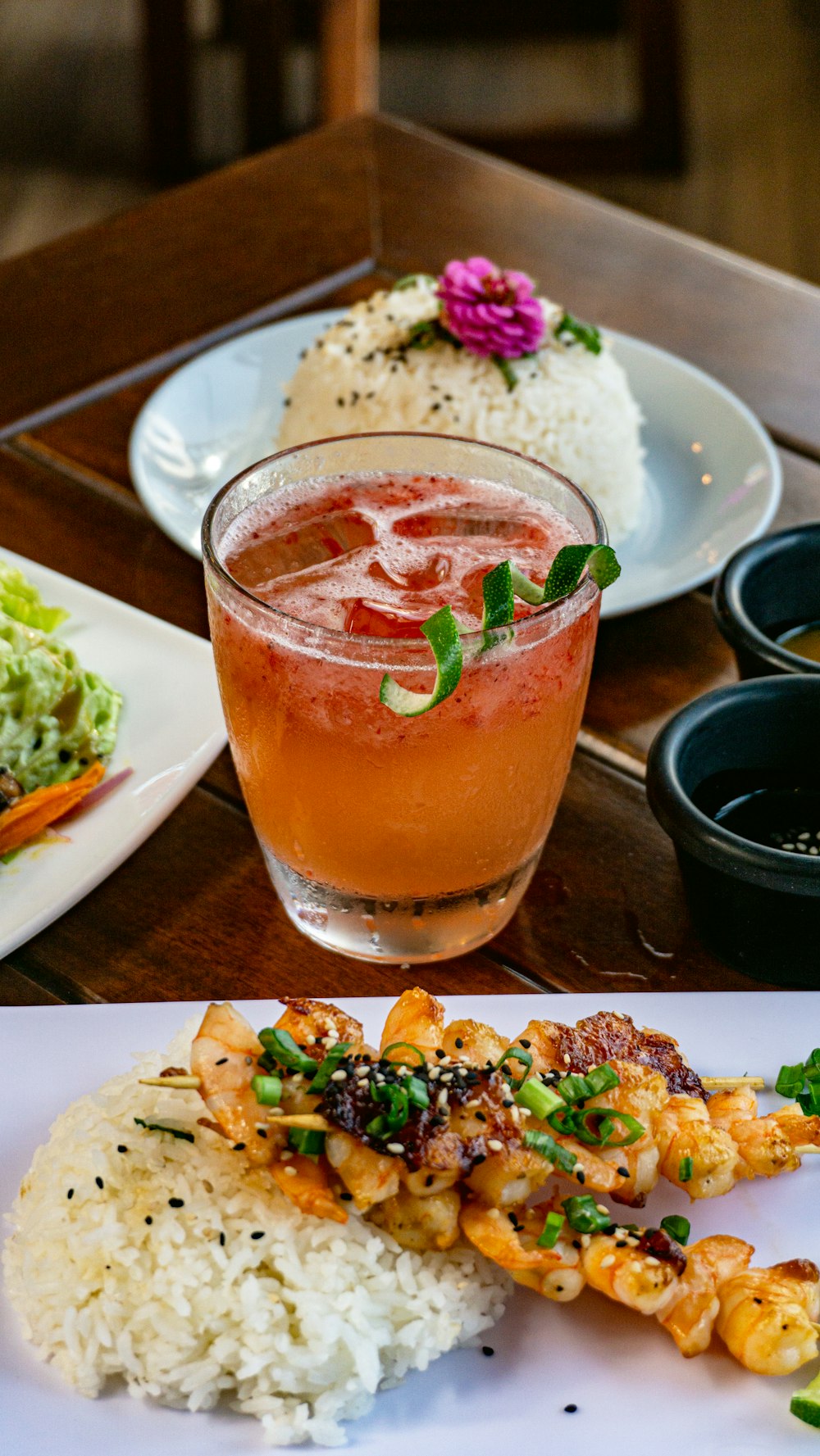 a plate of food and a drink on a table