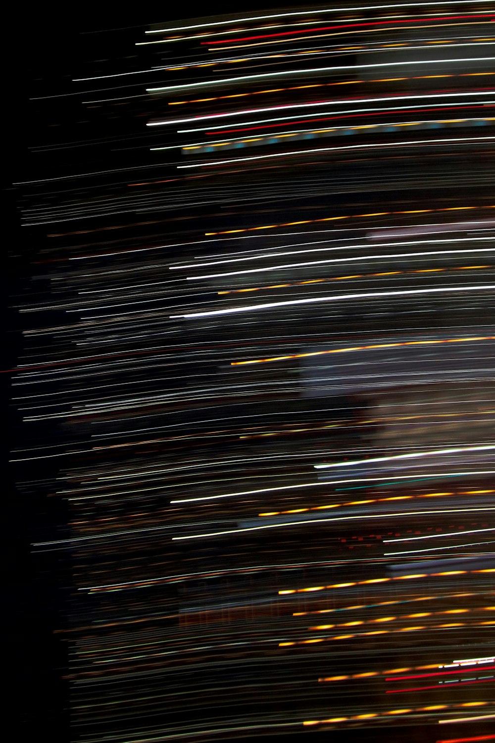 a very long exposure of a plane flying in the sky