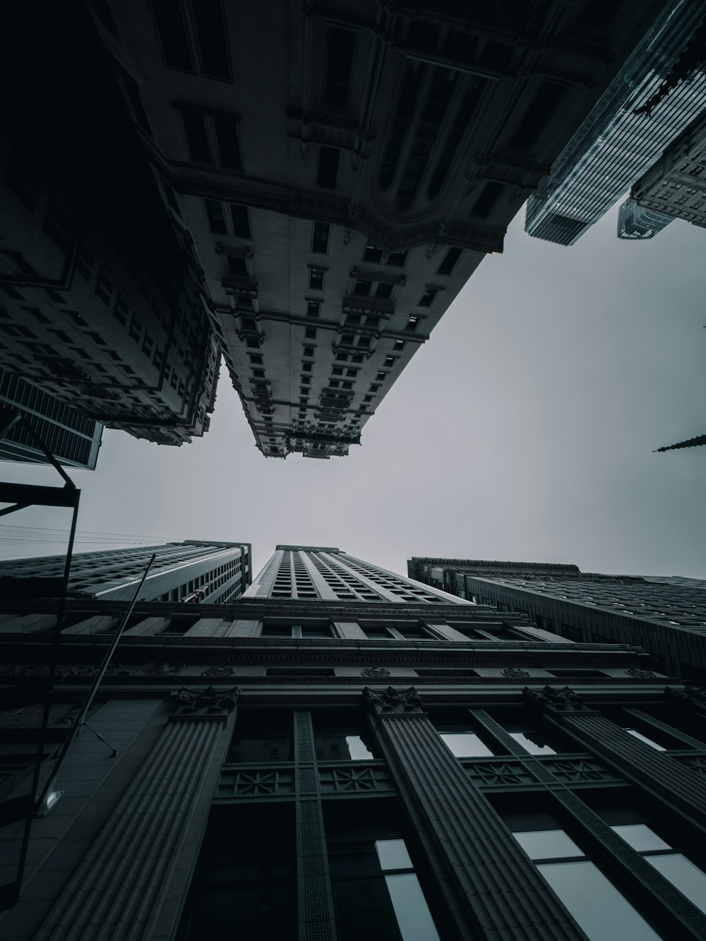 looking up at tall buildings from the ground