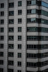 Close-up of a modern office building representing commercial spaces.