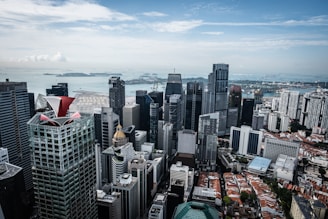 An aerial view of a modern city skyline showcasing financial and technological advancements.