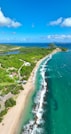 an aerial view of a beach and ocean