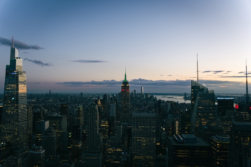 a view of a city at night from the top of a building