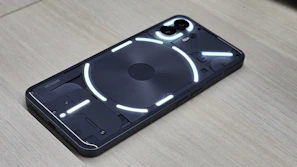 Hardware kill switches on the Andr Phone highlighted with vibrant red lighting