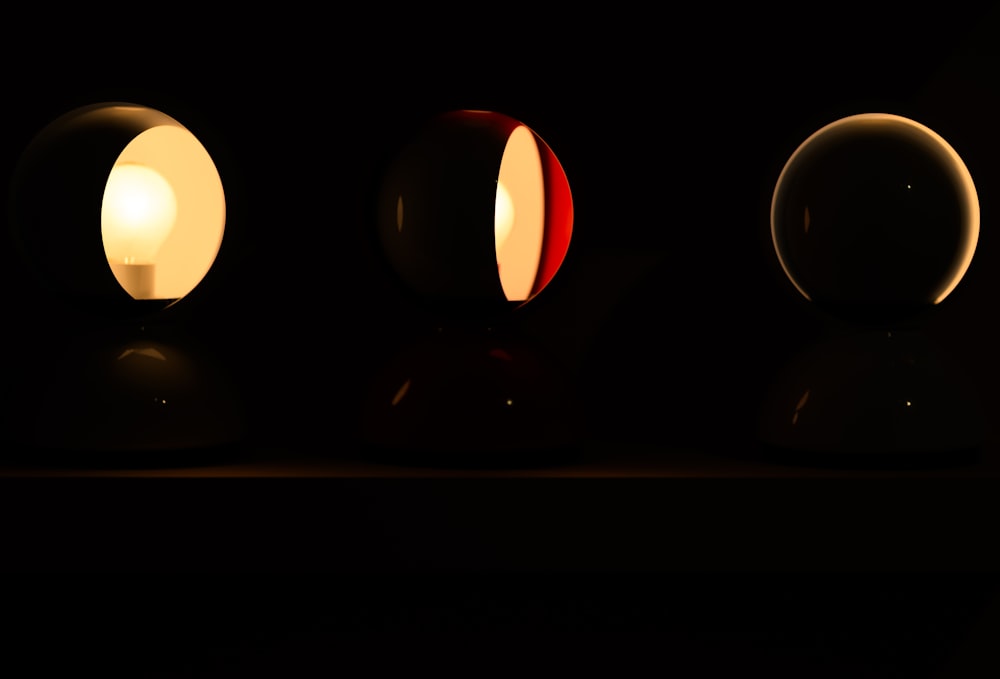 a group of three lights sitting on top of a table
