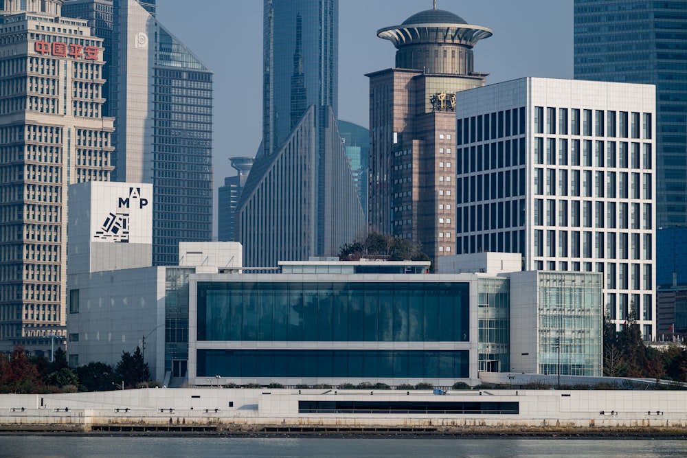 a view of a city with tall buildings in the background