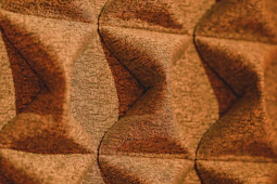 a close up of a wall with a pattern on it