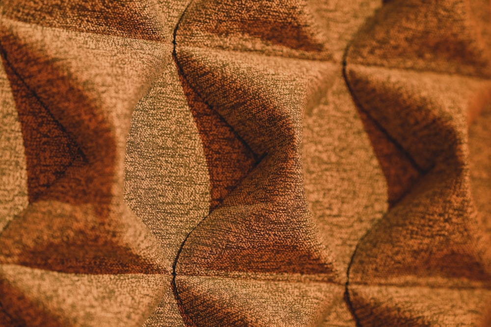 a close up of a wall with a pattern on it