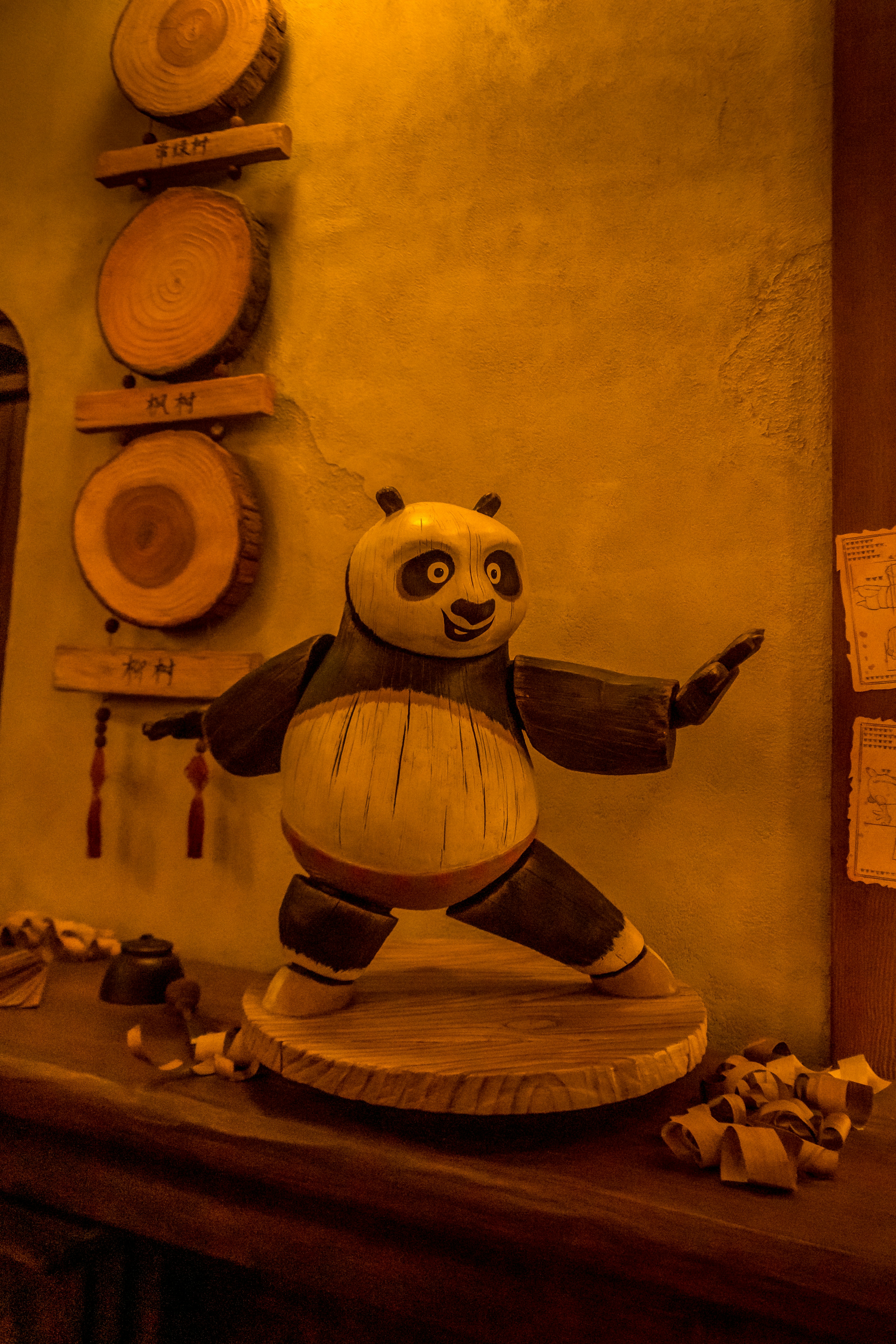 a statue of a panda standing on top of a table