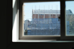 A panoramic view of a completed civil building with scaffolding removed, ready for use
