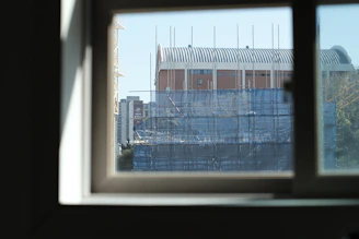 A panoramic view of a completed civil building with scaffolding removed, ready for use