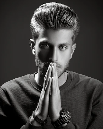 Portrait of Mr. Prince Jadhav in a stylish interior studio, reflecting creativity and professionalism.