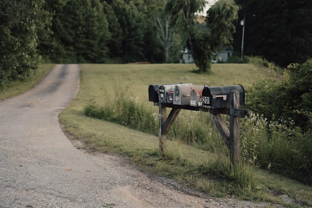 a mailbox sitting on the side of a road