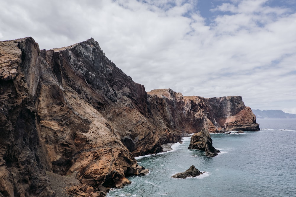 a view of the ocean from a cliff