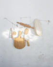 A collection of colorful kitchen gadgets and baking tools neatly arranged on a wooden countertop.