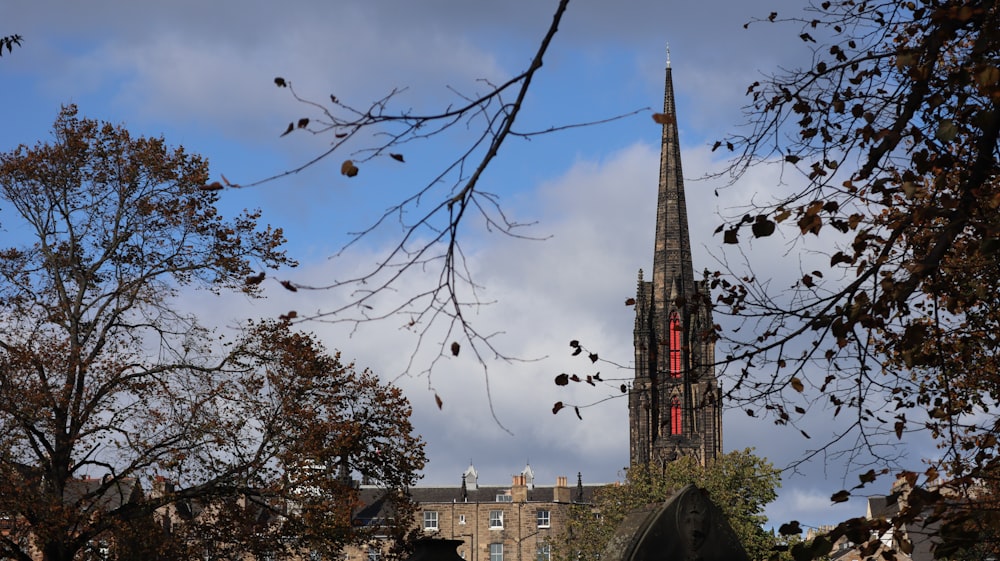 a tall tower with a clock on top of it