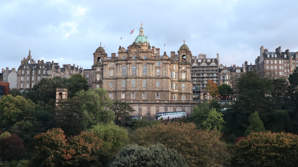 a large building with a green dome on top of it