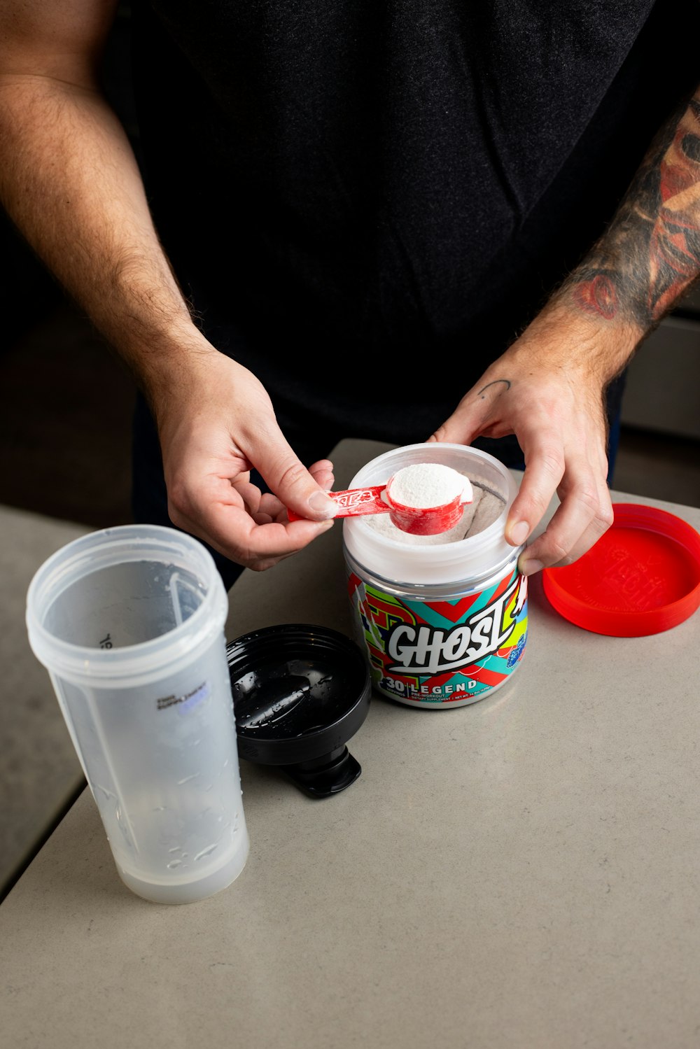 a man is putting candy in a container