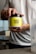 A satisfied customer holding a nectar home drink.