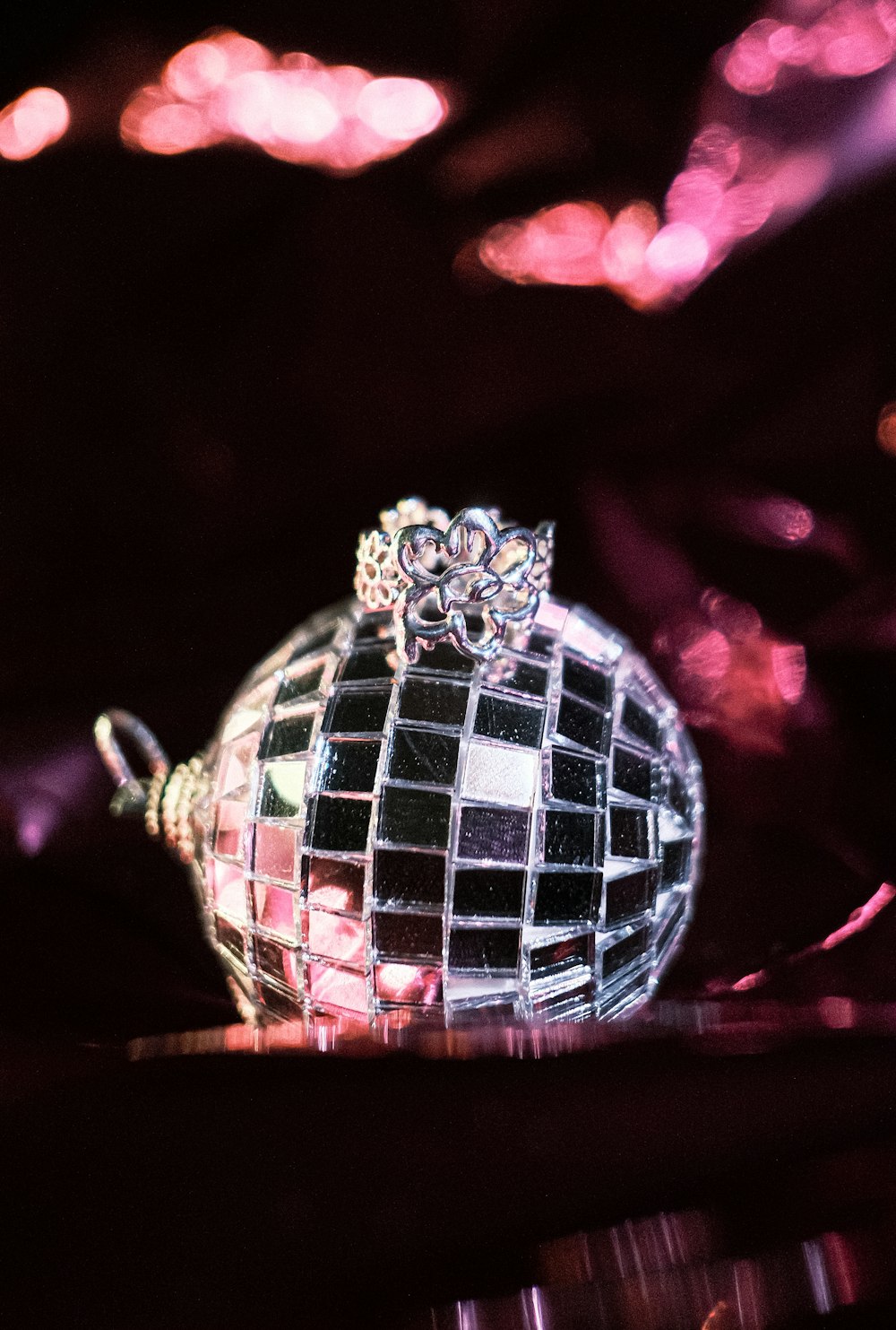 a disco ball ornament sitting on top of a table