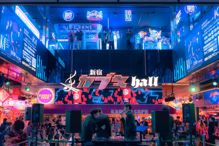A vibrant urban street scene with people wearing techno and rave-inspired clothing under neon lights.