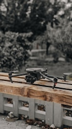 a camera sitting on top of a wooden pallet