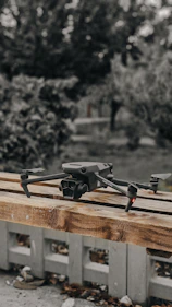 a camera sitting on top of a wooden pallet