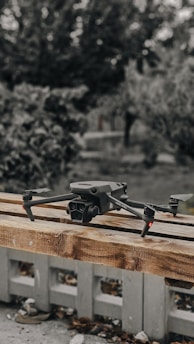 a camera sitting on top of a wooden pallet