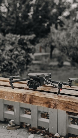a camera sitting on top of a wooden pallet