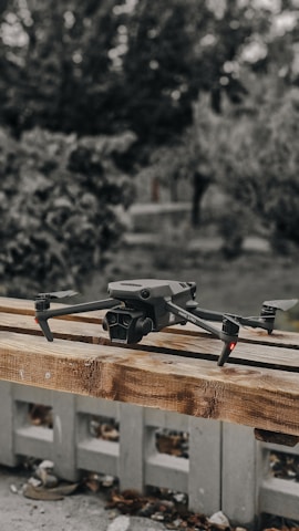 a camera sitting on top of a wooden pallet