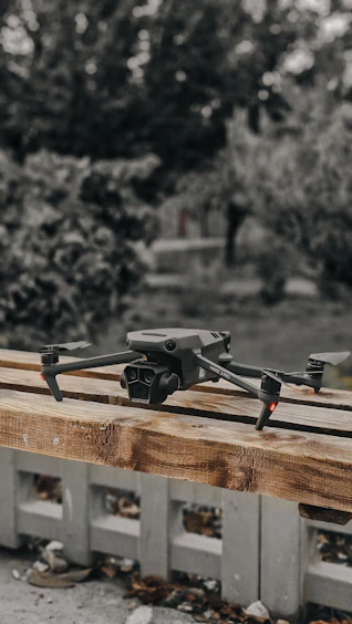 a camera sitting on top of a wooden pallet