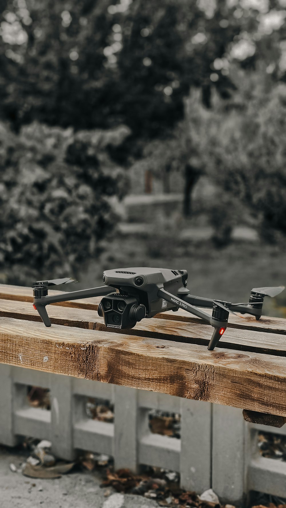 a camera sitting on top of a wooden pallet