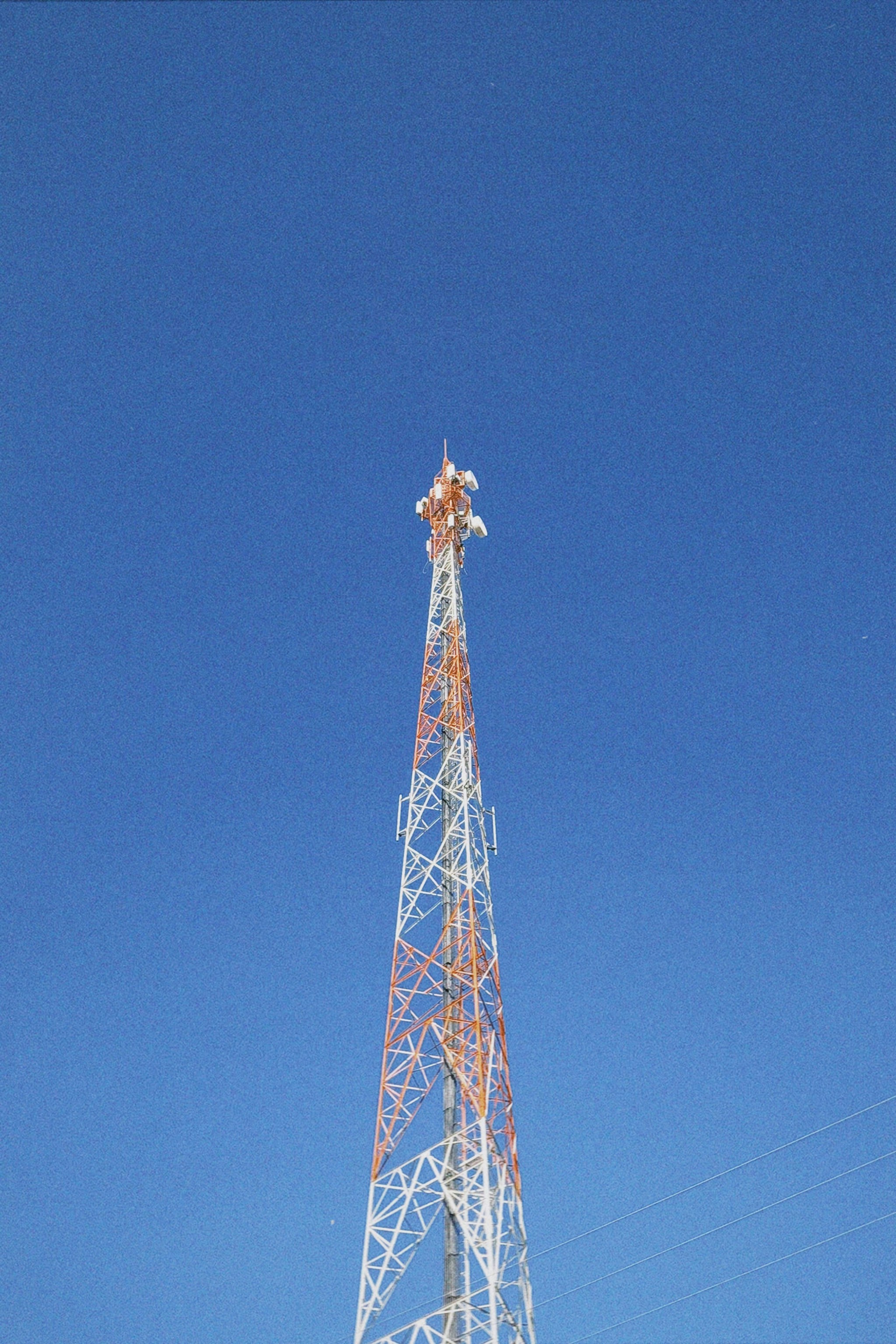 a very tall tower with a clock on it's side