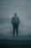 A solitary figure stands in the midst of dense fog, wearing a formal suit and tie, with an indistinct background structure adding to the mysterious atmosphere.