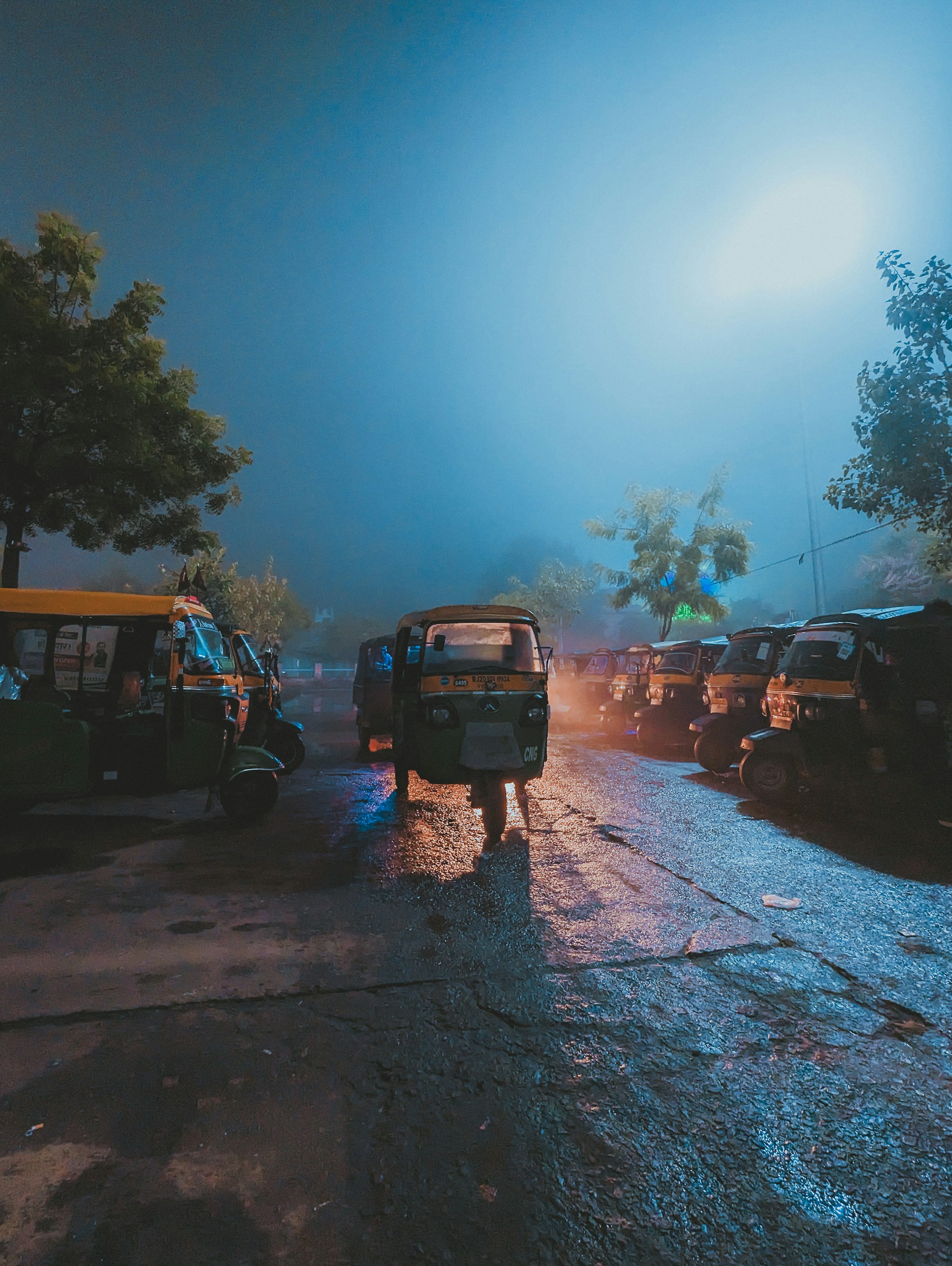 woman wearing yellow long-sleeved dress under white clouds and blue sky during daytime