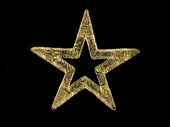 a lighted star on a black background