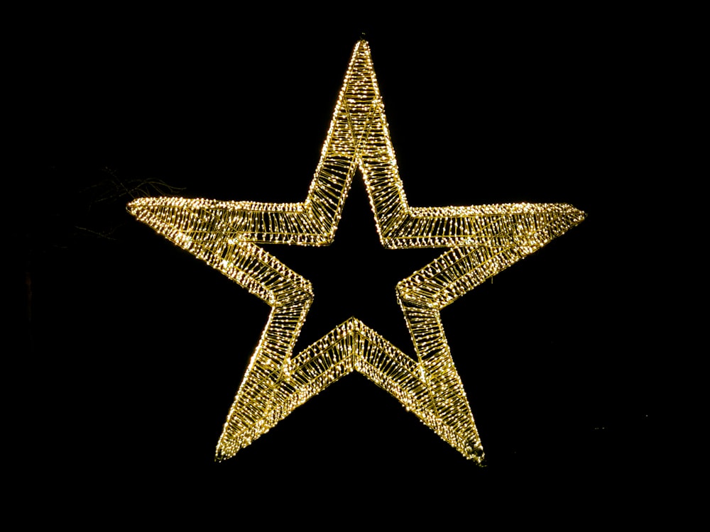 a lighted star on a black background