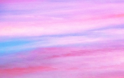 A dreamy gradient sky blending soft blues and nostalgic pinks.