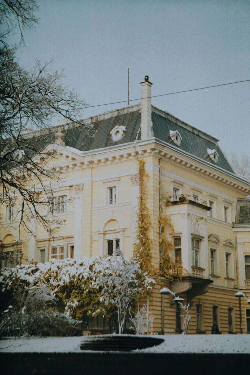 a large building with a clock on the top of it