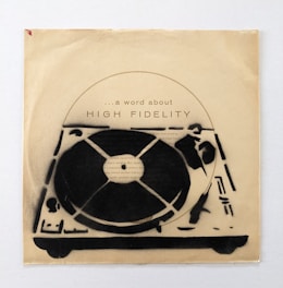 A vintage-style illustration of a record player with prominent text that reads 'a word about HIGH FIDELITY'. The design uses a monochromatic color scheme with shades of black and beige. The image has a textured, worn look that emphasizes a retro aesthetic.