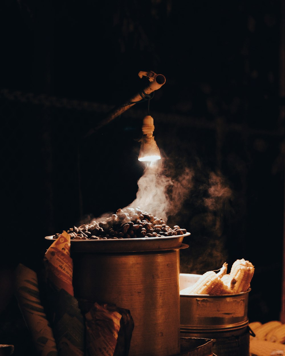 a pot of food with steam coming out of it